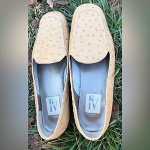 Chic neutral ostrich-embossed leather loafers in a soft camel/tan